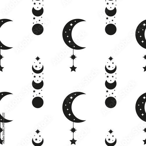 Seamless pattern with crescents, moon phases and stars.