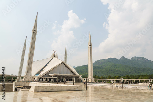 Islamabad, Pakistan - September 2021: Visit to the beautiful Shah Faisal Mosque in Islamabad, Pakistan during a sunny day and cloudy sky.