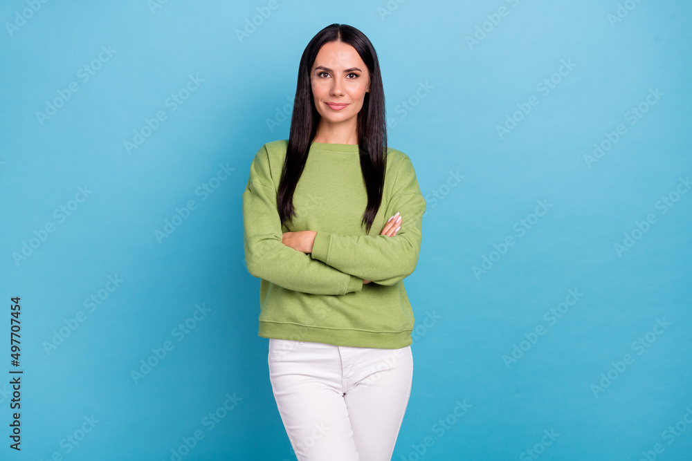 Photo of young stunning skilled businesswoman working in modern it company isolated on blue color background Photo of young stunning skilled businesswoman working in modern it company isolated on blue color background