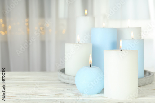 Concept of relaxation with aroma candles, space for text