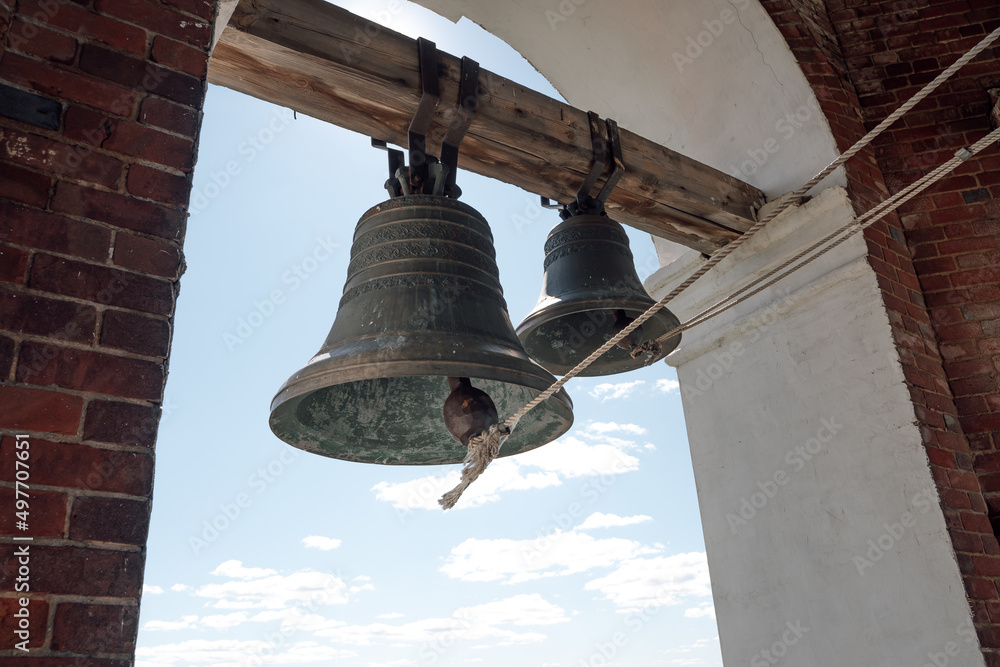 Traditional old bells in a church tower from the middle ages.