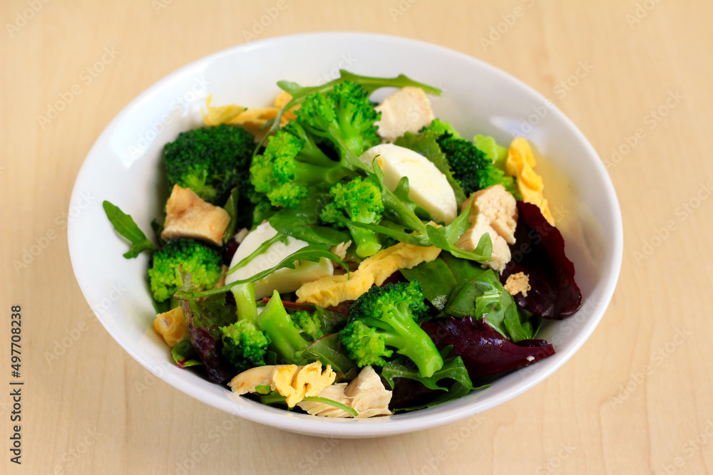 Healthy salad with chicken, egg, broccoli and mozzarella Healthy salad with chicken, egg, broccoli and mozzarella