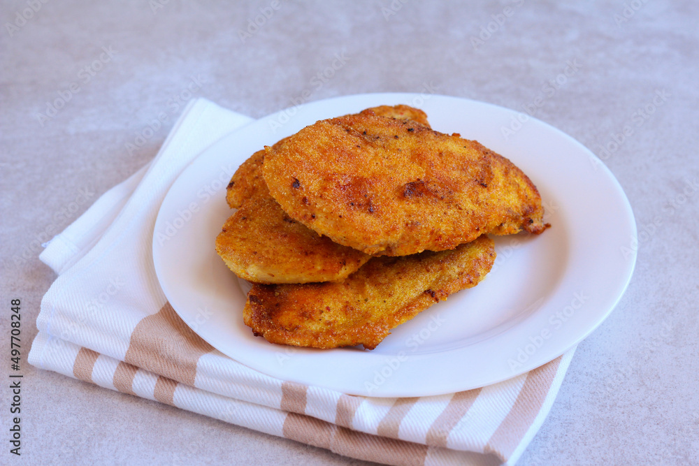 Chicken schnitzel on plate Chicken schnitzel on plate