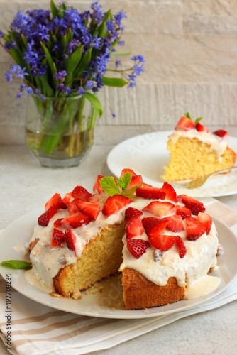 Coconut cake with yogurt and strawberry topping