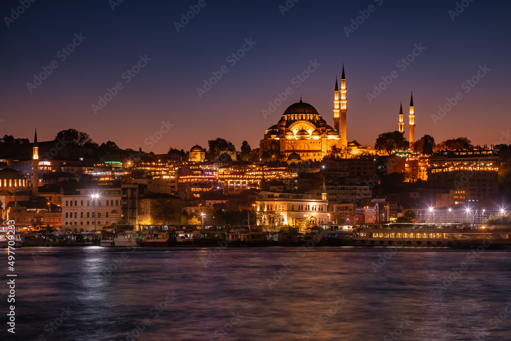 Istanbul cityscape with illuminated Suleymaniye Mosque