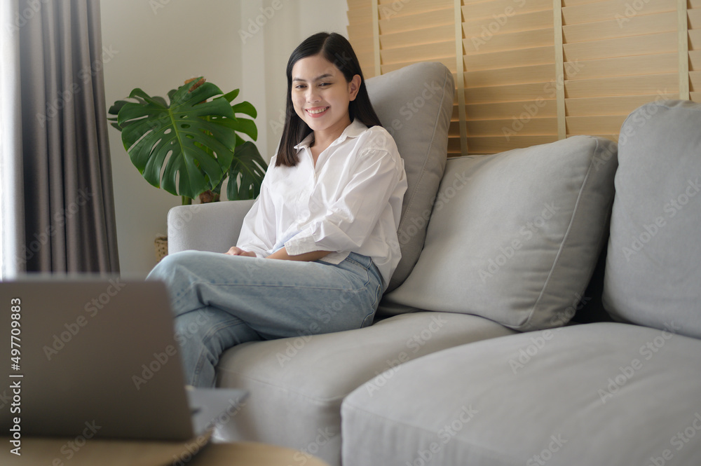 Young beautiful woman is working with her computer at home. Young beautiful woman is working with her computer at home.