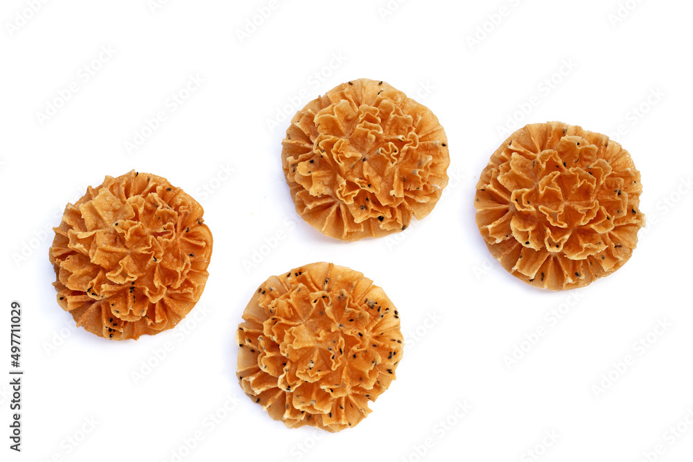 Crispy lotus blossom cookie in white background.