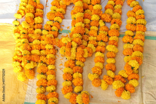 Beautiful marigold flowers Garland on black background