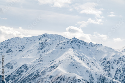 Fototapeta Naklejka Na Ścianę i Meble -  Snow-covered peaks of the Kyrgyz Ala-Tau