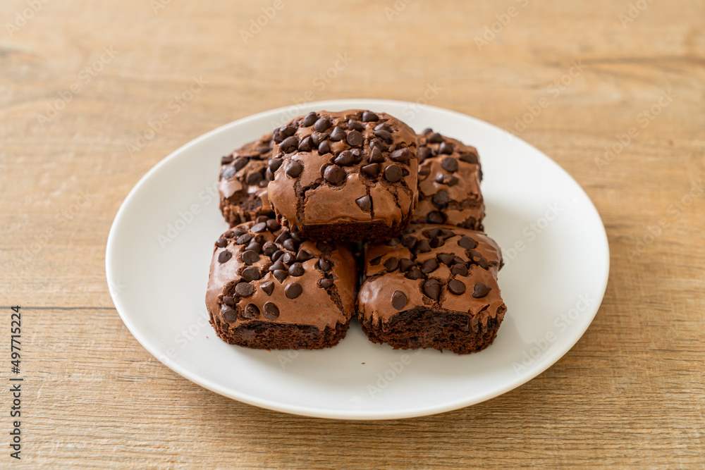 dark chocolate brownies topped by chocolate chips dark chocolate brownies topped by chocolate chips
