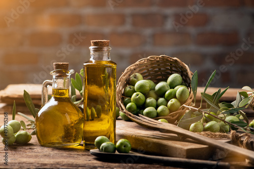Olives and olive oil in a bottles