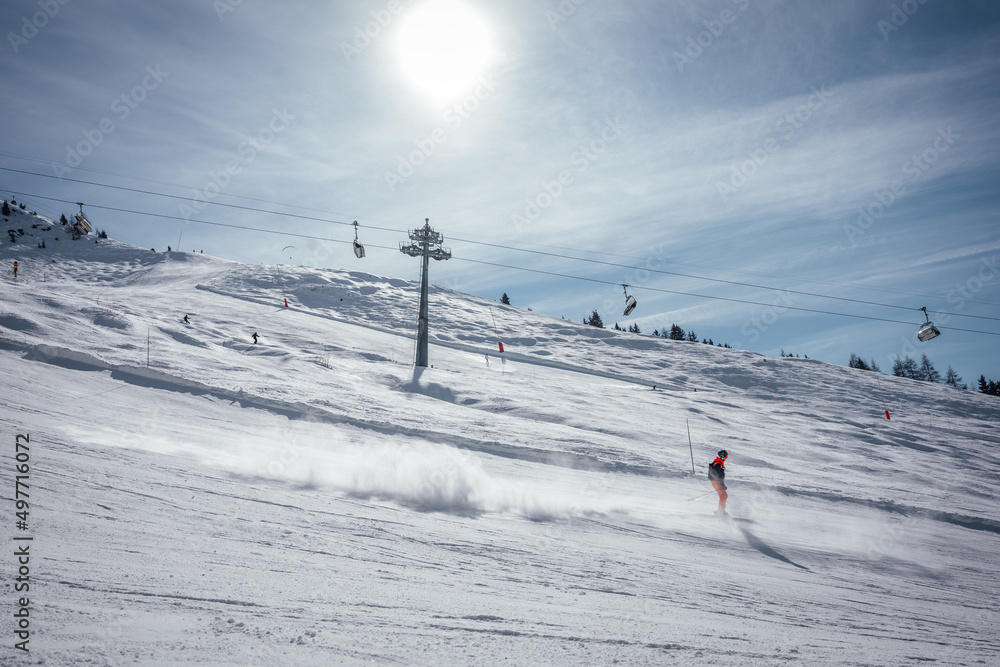 skier on the slope in the sun - obrazy, fototapety, plakaty 