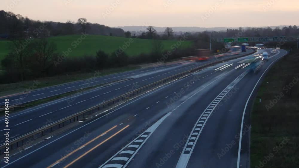 Busy time lapse 'ghost' traffic at a busy motorway intersection Busy time lapse 'ghost' traffic at a busy motorway intersection