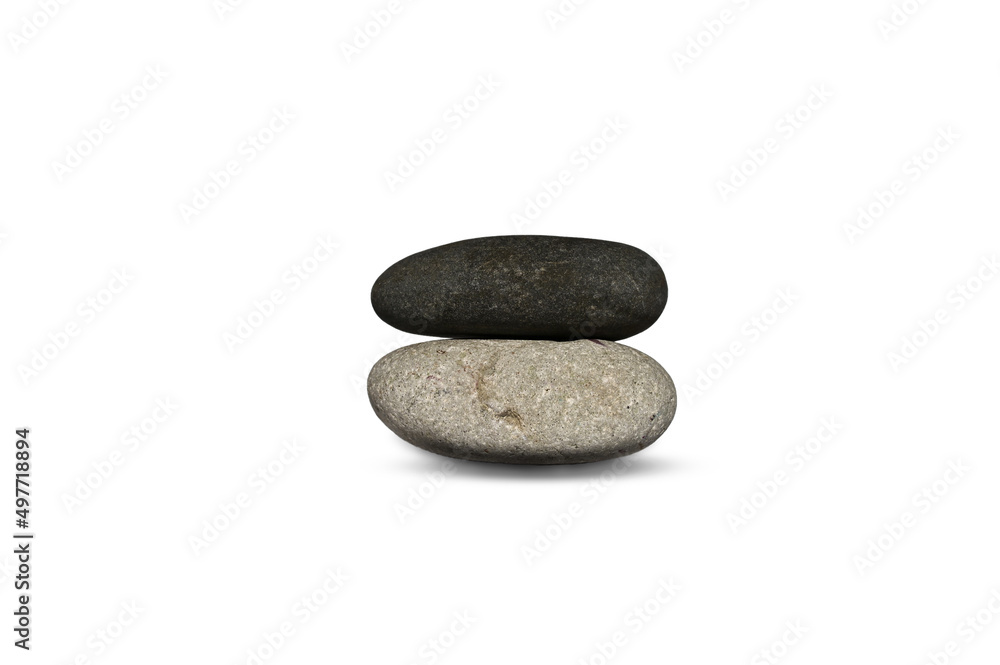 Balance of stones. Stones for spa treatments on a white background. The concept of meditation in stones is stacked in a pyramid. Balance of stones. Stones for spa treatments on a white background. The concept of meditation in stones is stacked in a pyramid.