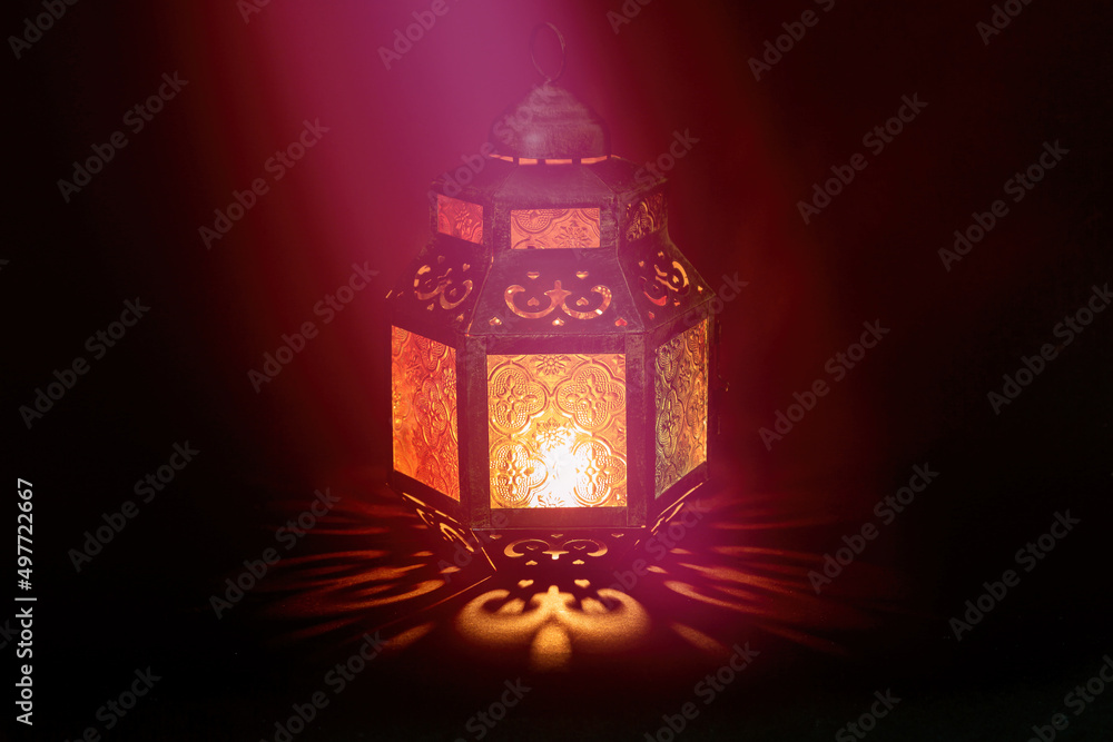 Traditional Arabic lantern lit up for celebrating the Holy Month of Ramadan Traditional Arabic lantern lit up for celebrating the Holy Month of Ramadan