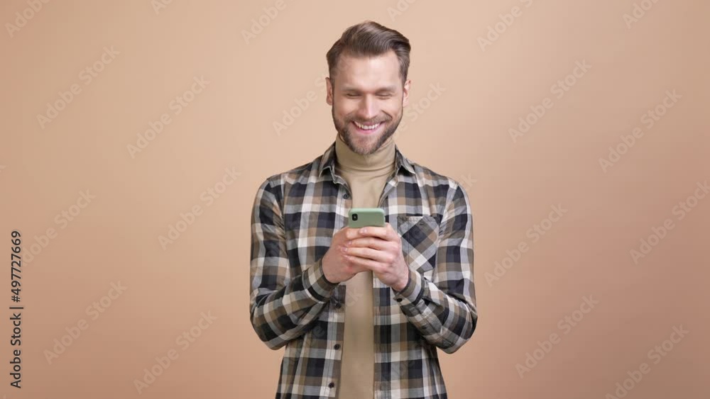 Millennial guy use gadget read blogger post isolated pastel color background Millennial guy use gadget read blogger post isolated pastel color background