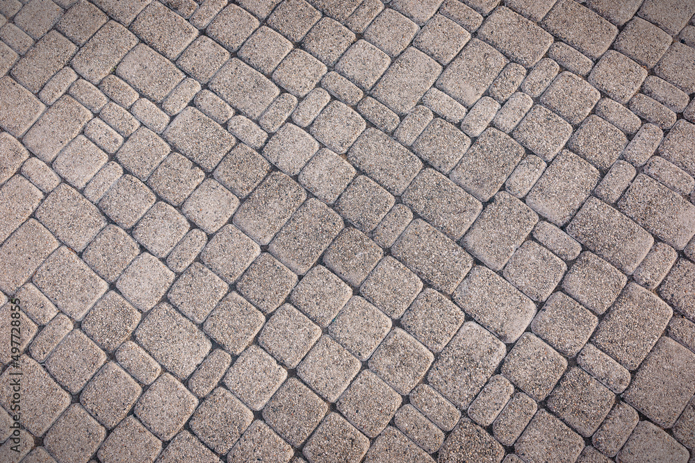 Gray stone tiles lying diagonally. Stone wall. A great background for your design. Gray stone tiles lying diagonally. Stone wall. A great background for your design.