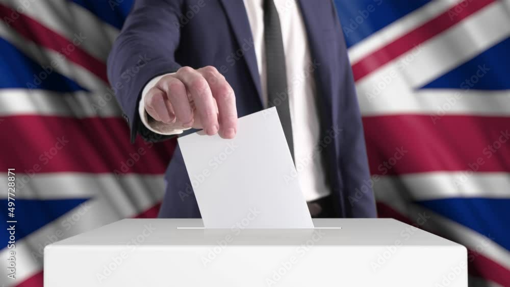 Voting. Man Putting a Ballot into a Voting Box with British Flag on Background.