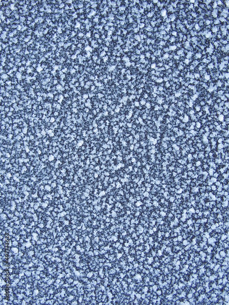 Blue frost texture on the surface. Winter background. Template for product display. Ice texture background. Frost, ice surface. Close up of decorative winter frozen pattern. Blue frost texture on the surface. Winter background. Template for product display. Ice texture background. Frost, ice surface. Close up of decorative winter frozen pattern.