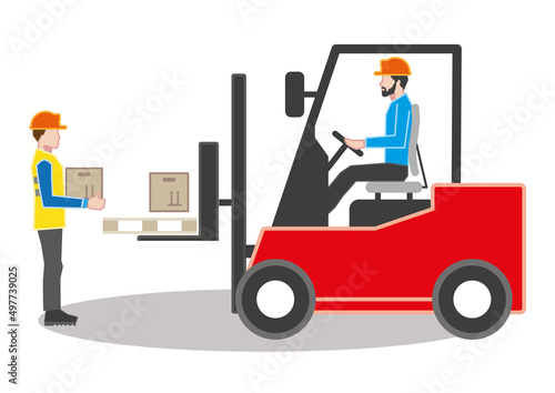 Worker unloading boxes from forklift