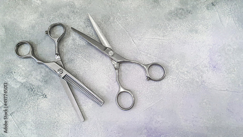 Special hairdressing scissors and comb. Professional equipment.