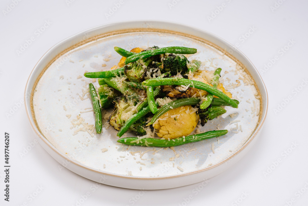 Vegetaria dish of boiled broccoli, asparagus and parmesan Vegetaria dish of boiled broccoli, asparagus and parmesan