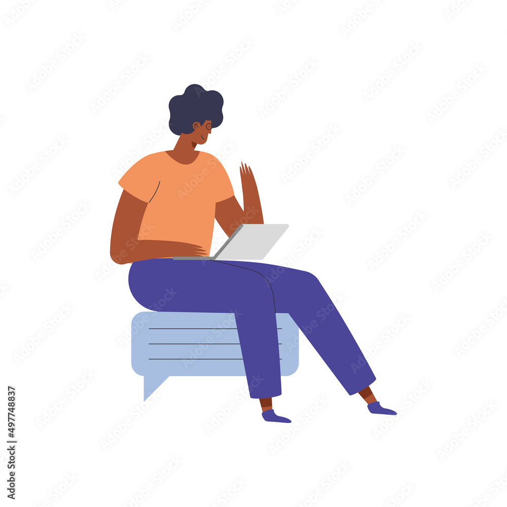 afro man seated using laptop afro man seated using laptop