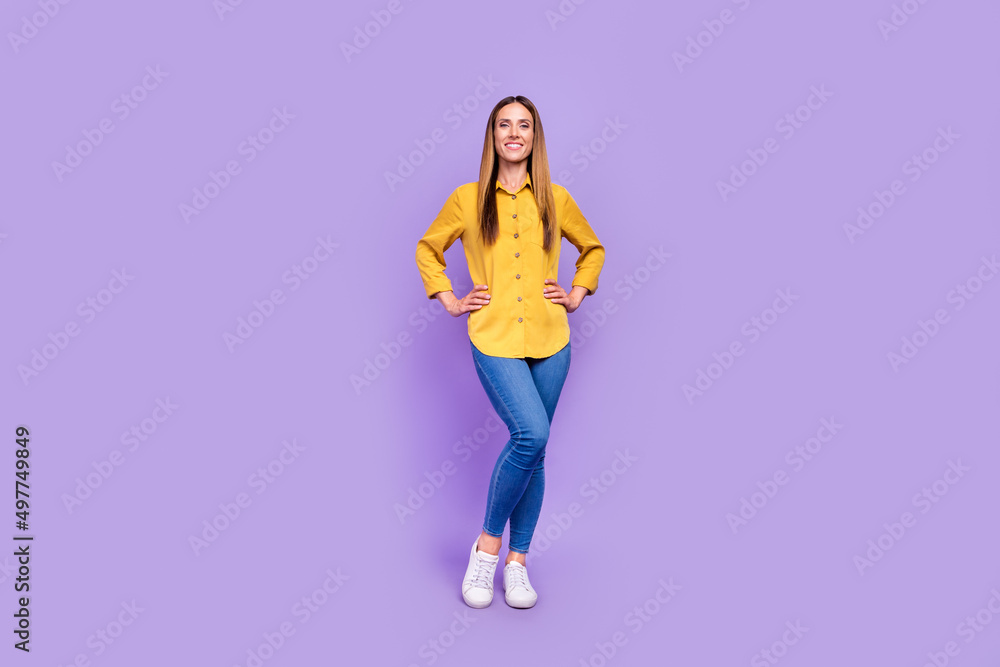 Full length image of charming cute business lady posing on camera isolated on purple color background