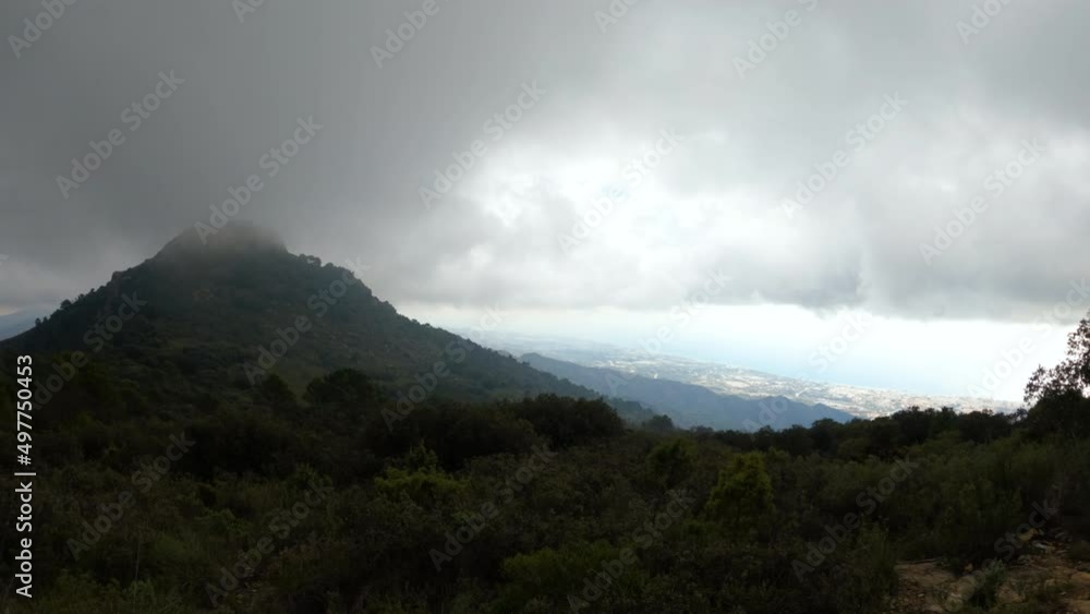 4k View from the big mountain, La Concha in Marbella, Spain. Coast and city can be seen in the background. 4k View from the big mountain, La Concha in Marbella, Spain. Coast and city can be seen in the background.