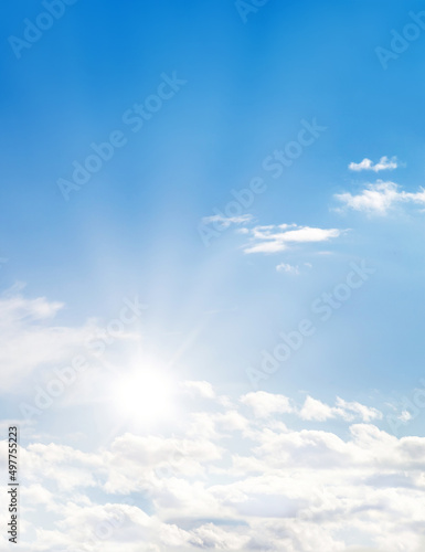 Light fluffy clouds with sun on the sky soft focus. Heavenly clouds background in summer day. Concept of freedom  relaxation  ecology. Copy space. Empty space..