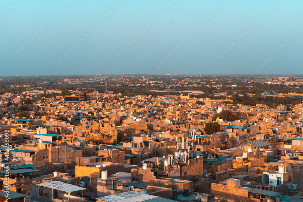 A view of Jaisalmer city during sunset. An aerial view of a under developed city of India.