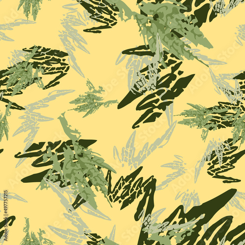 Field camouflage of various shades of yellow and green colors