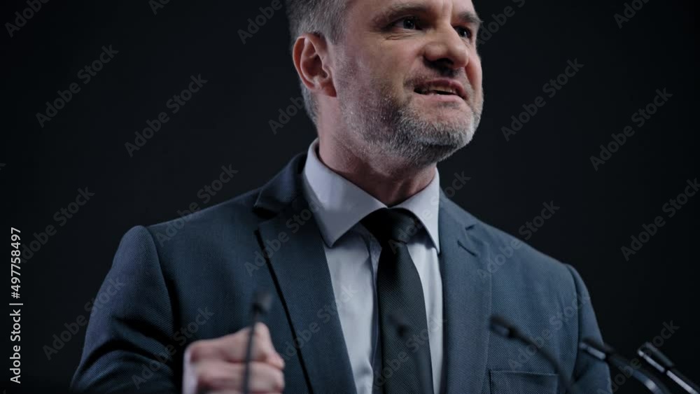 Angry politician delivering strong speech, elections, presidential campaign Angry politician delivering strong speech, elections, presidential campaign