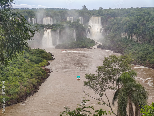 view of the iguaçu falls with macuco safari boat. Iguaçu Falls is a set of about 275 waterfalls on the Iguaçu River.