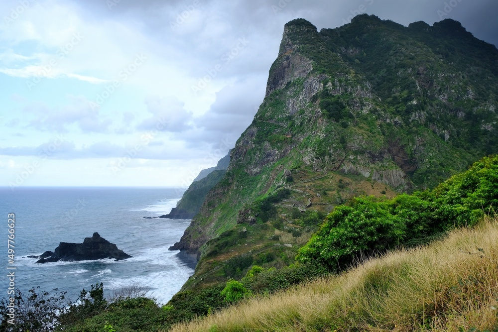 Views of Caminho da Entrosa - Miradouro Sao Cristovao. Scenery of green cliffs on Madeira island, Portugal