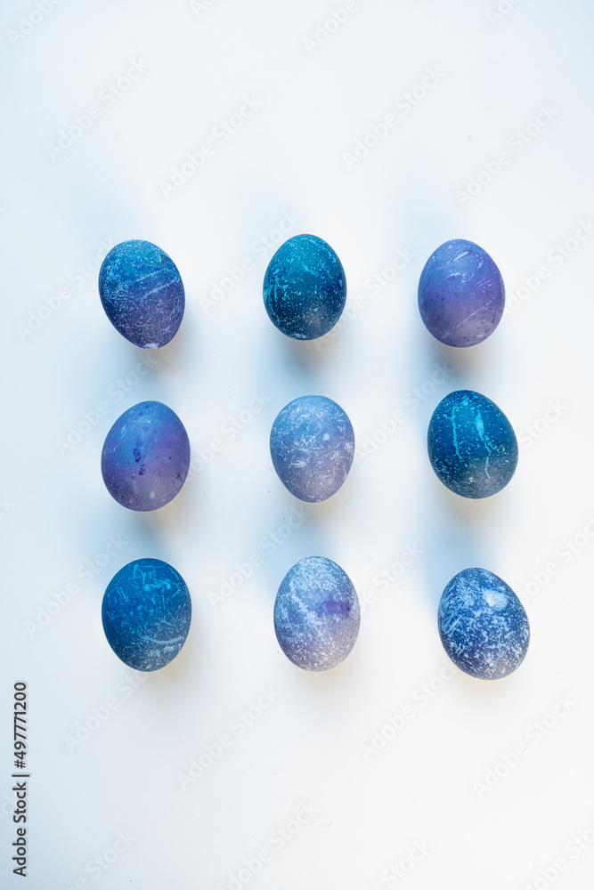 Space colored eggs on white background. Space colored eggs on white background.