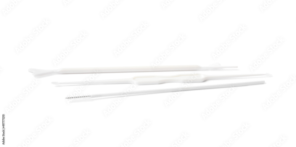 Disposable gynecological examination kit on white background Disposable gynecological examination kit on white background