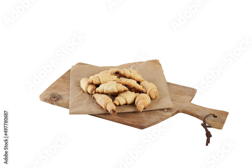 Isolated russian slavic traditional pastry called roguelikes. Cakes bagels. Crispy croissants. Food on white background photo