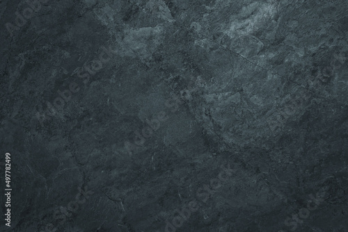 Dark gloomy surface background with grunge rough peeled paint texture