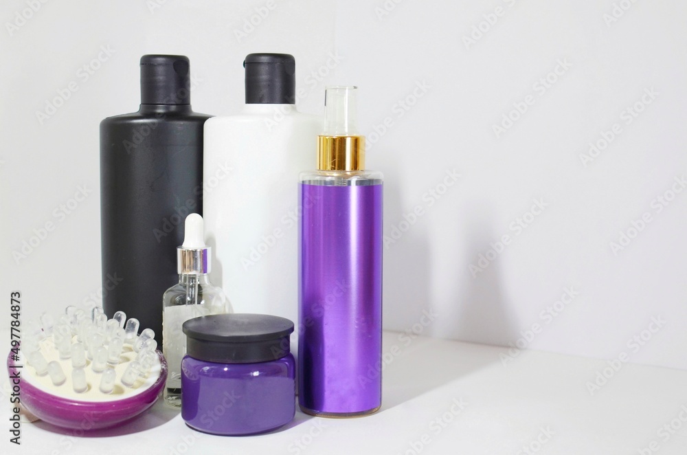 Shampoo, conditioner and creams on the white background Shampoo, conditioner and creams on the white background