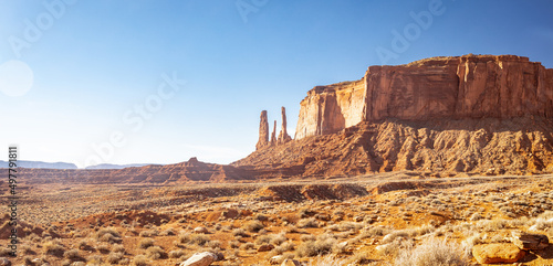 Panorama of Monument Valley on a bright sunny day in Arizona.
