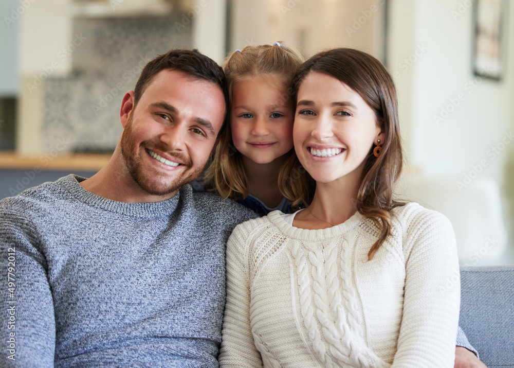 The best support system. Shot of a young family relaxing on the couch at home. The best support system. Shot of a young family relaxing on the couch at home.