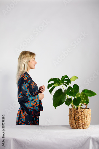 Young beautiful lady in a colorful trendy and fashionable kimono.