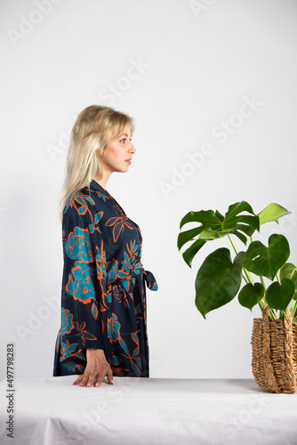 Young beautiful lady in a colorful trendy and fashionable kimono.