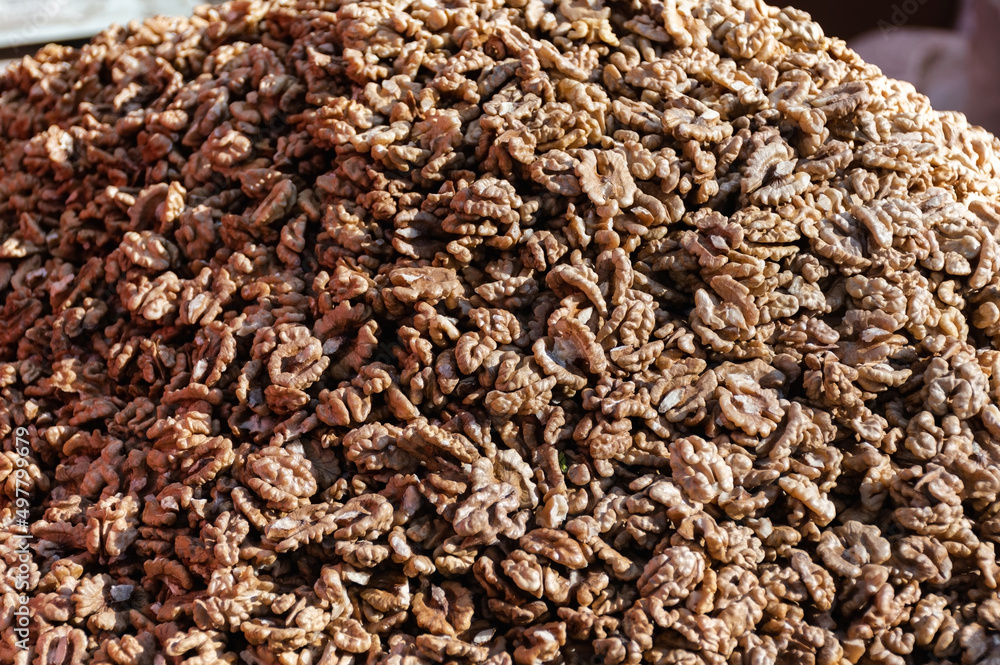 Heap of walnut kernels. Walnuts background. Heap of walnut kernels. Walnuts background.