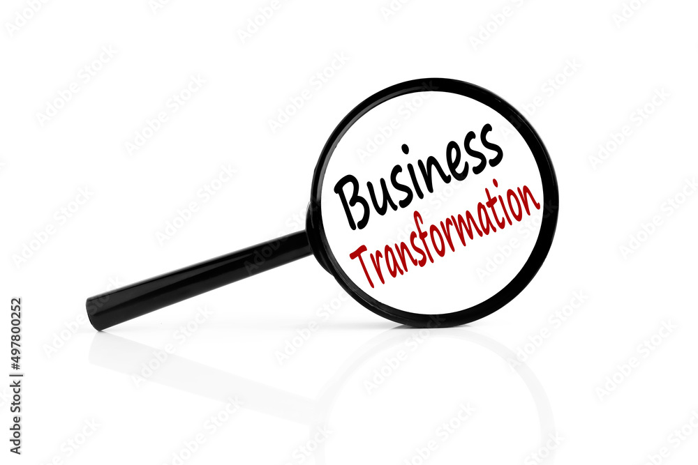 Business Transformation white background with an inscription on glass on a magnifying glass in red and black font Business Transformation white background with an inscription on glass on a magnifying glass in red and black font