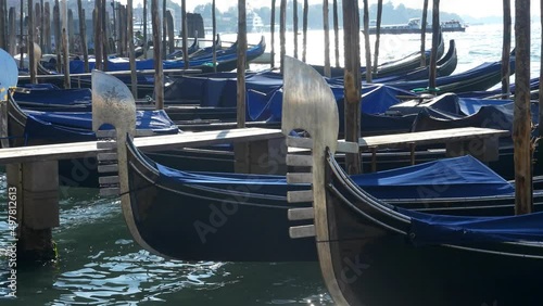 Gondolas bobbing on the Grand Canal, Venice photo