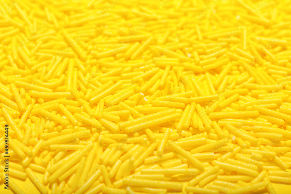 Heap of yellow sprinkles as background Heap of yellow sprinkles as background