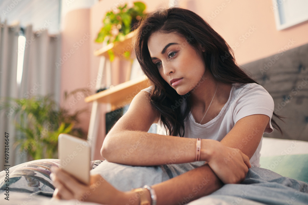 Find your best angle and strike a pose. Shot of a young woman taking selfies in bed at home. Find your best angle and strike a pose. Shot of a young woman taking selfies in bed at home.