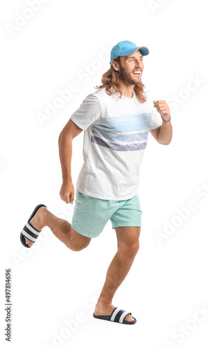 Handsome running guy on whi...